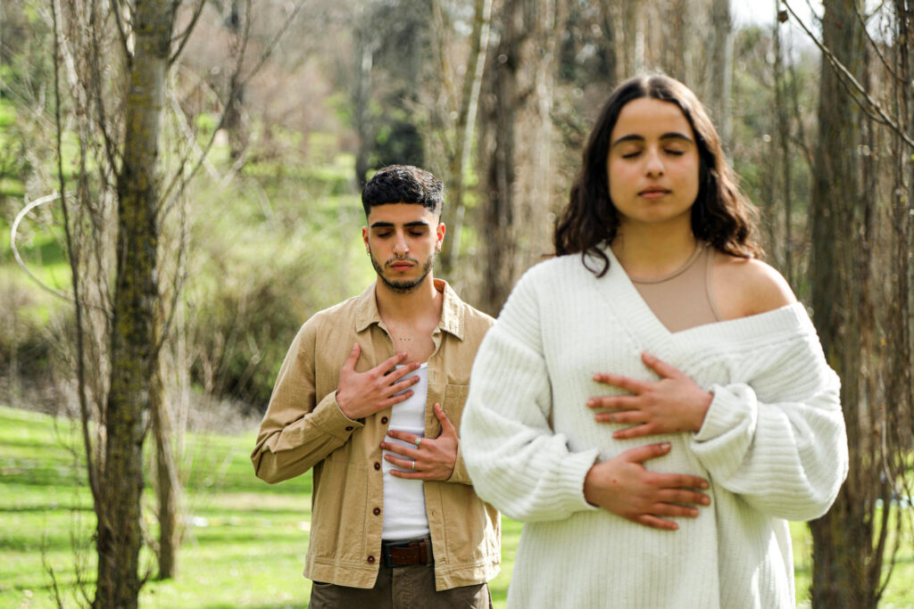 Young couple doing erotic breathing exercises