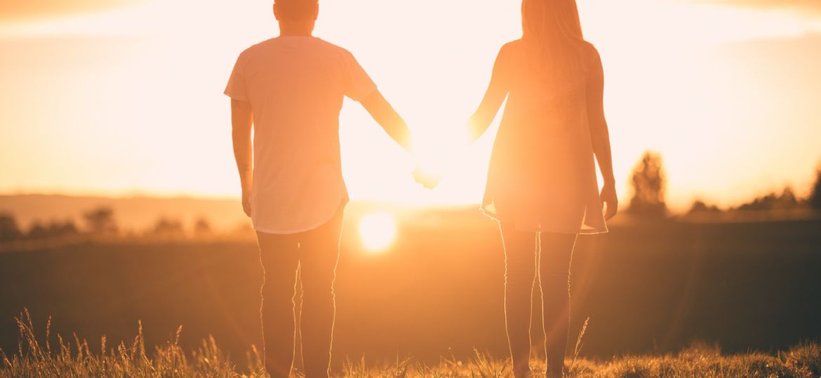 Couple holding hands in successful relationship