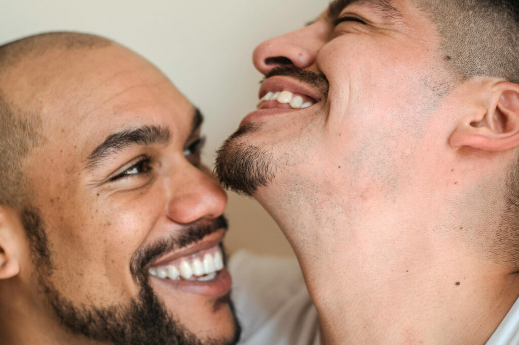 Two men reading each other's body language on the first date