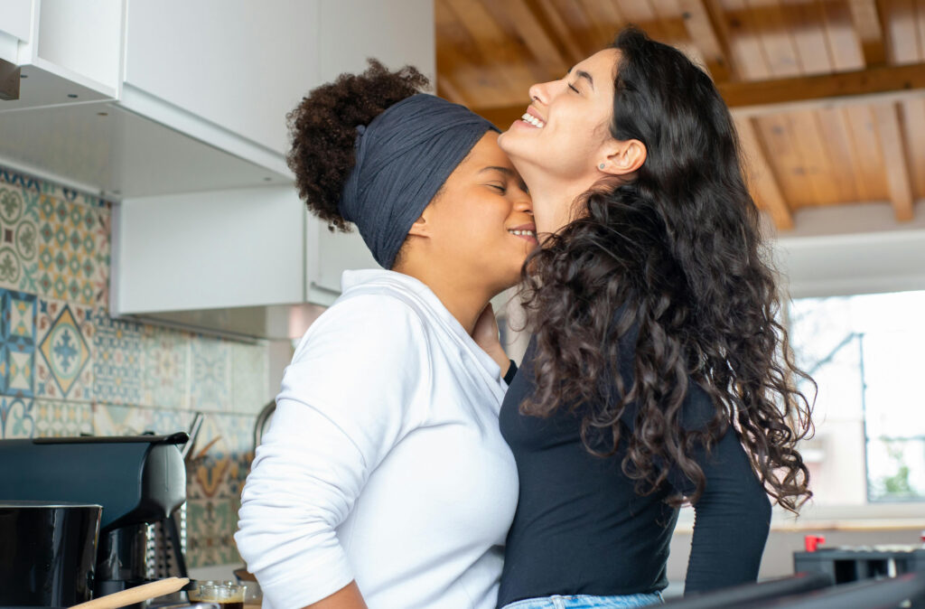 Two women during a somatic play exercise