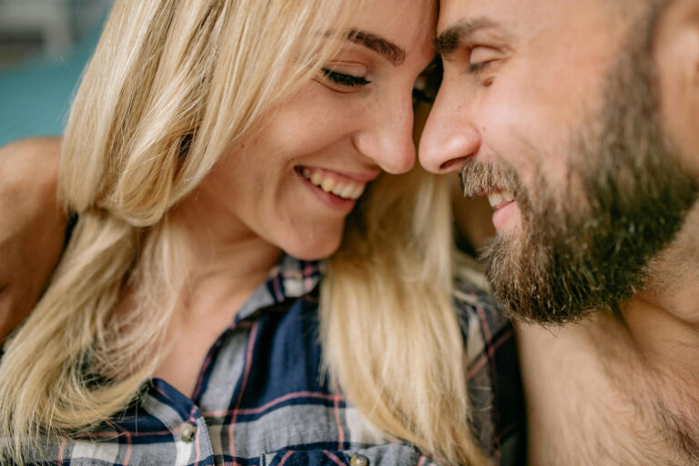 Happy couple discussing their attachment styles and sex